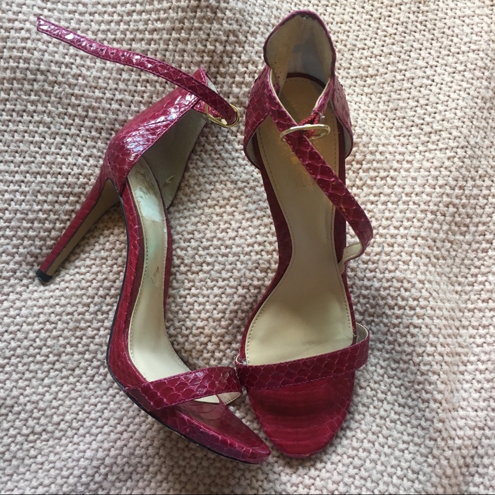 Red snakeskin stilettos